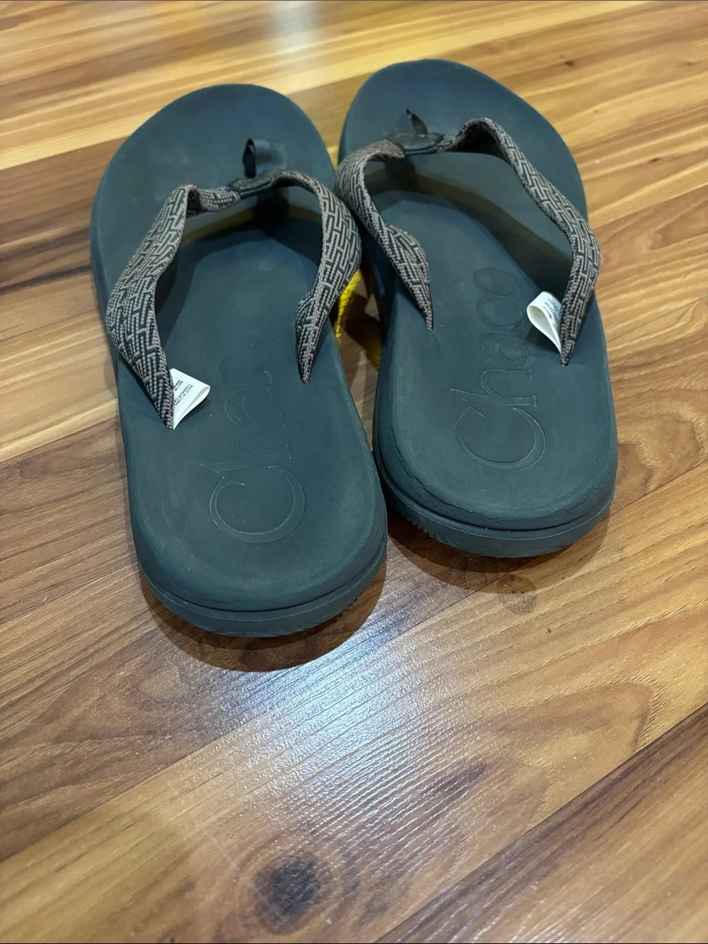 Chaco Men's Black Footbed with Brown Patterned Strap Flip Sandals